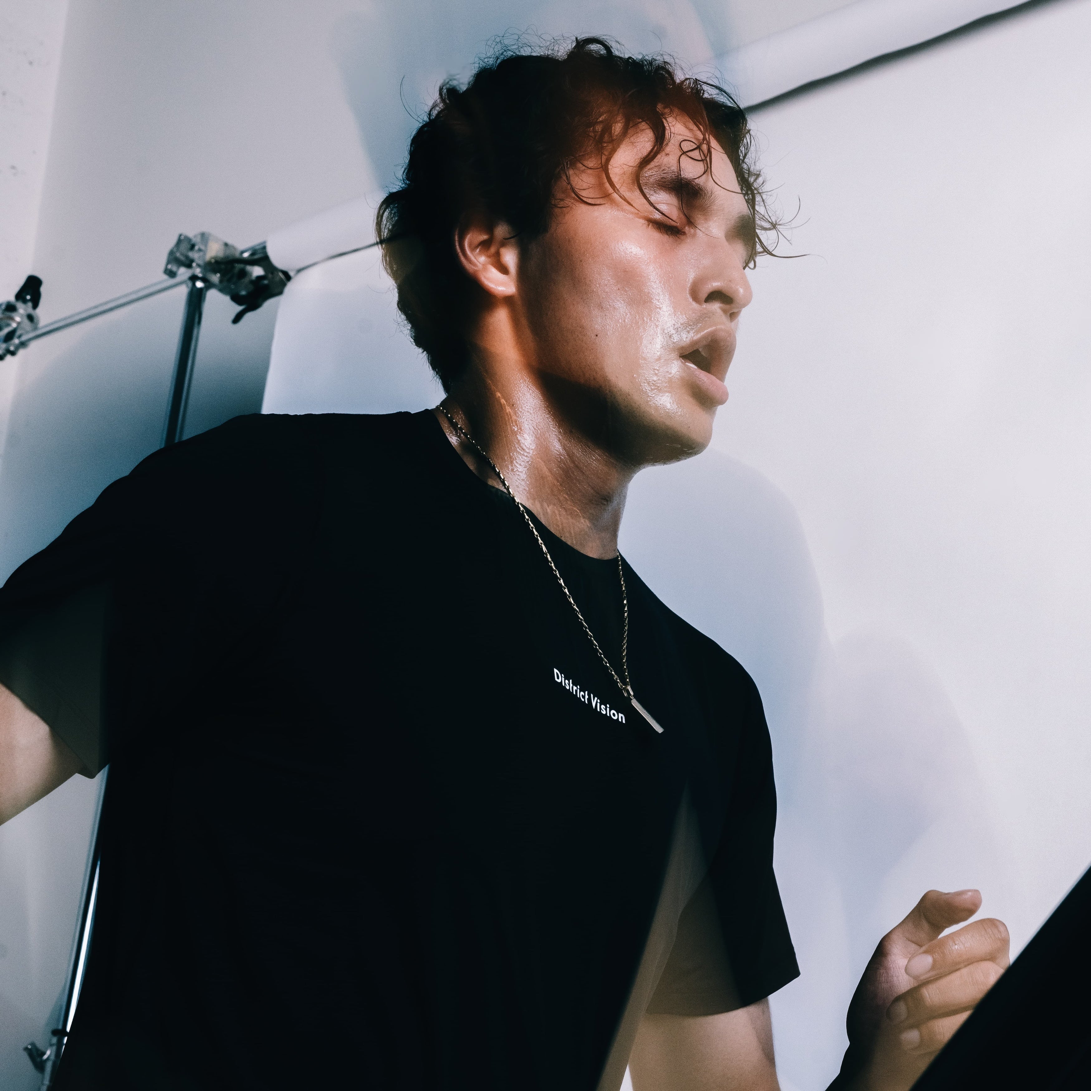 Man looking winded while working out for the first time before joining the Human Sync longevity program for better health.